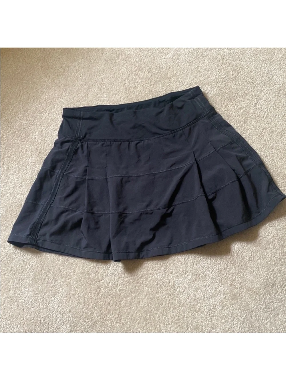 Lululemon black Athletic skirt with built-in biker shorts. Size 4